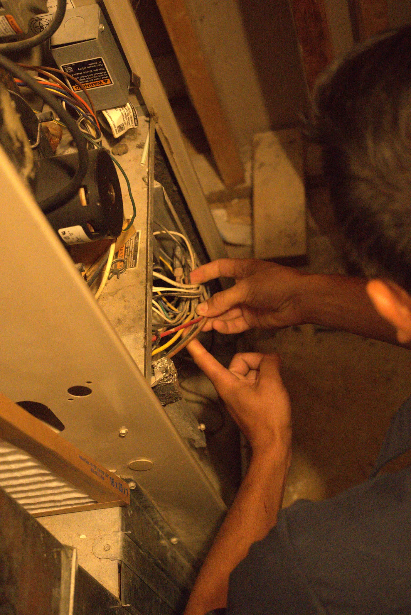Temperstead technician working on a furnace