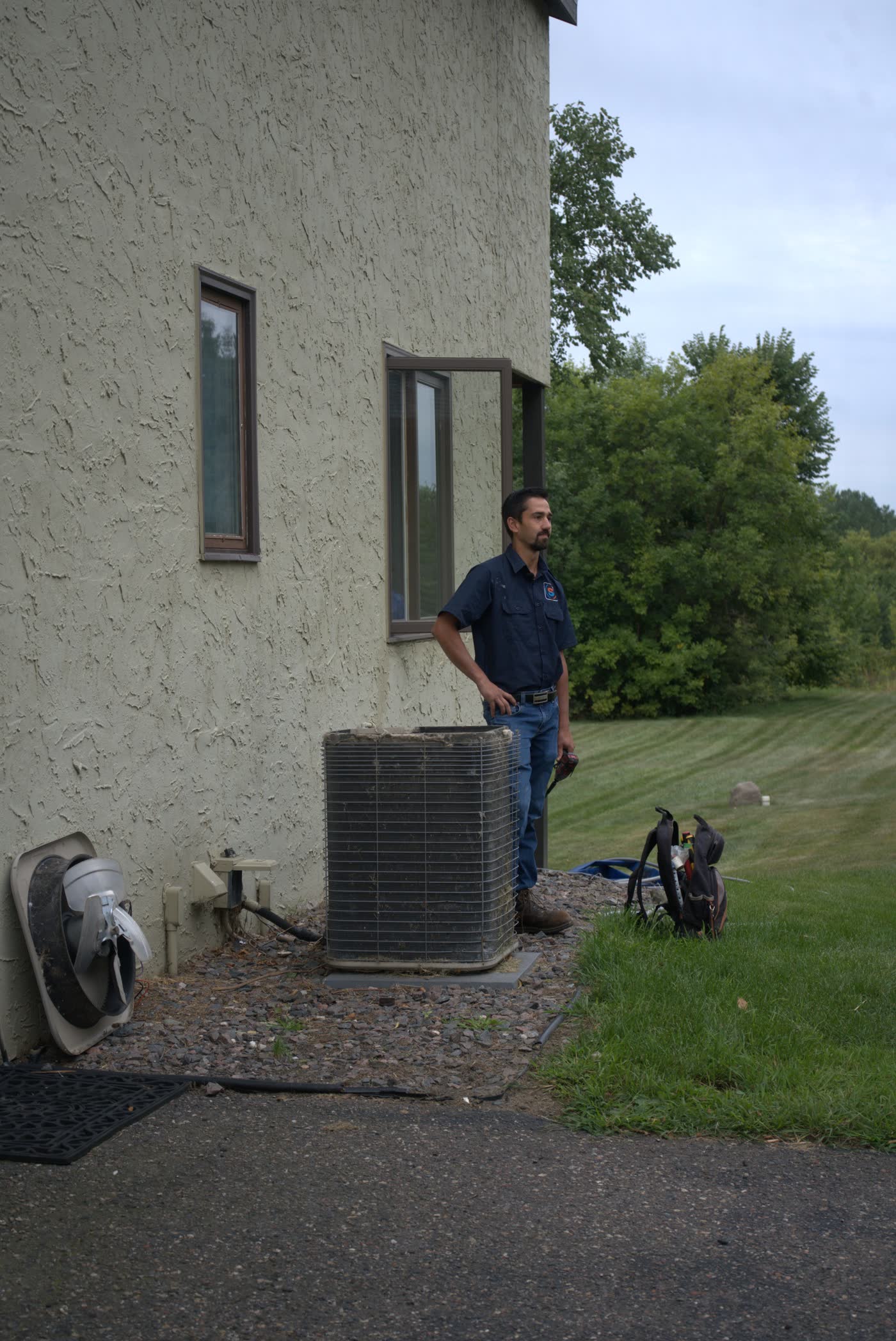 Temperstead technician walking a customer's yard